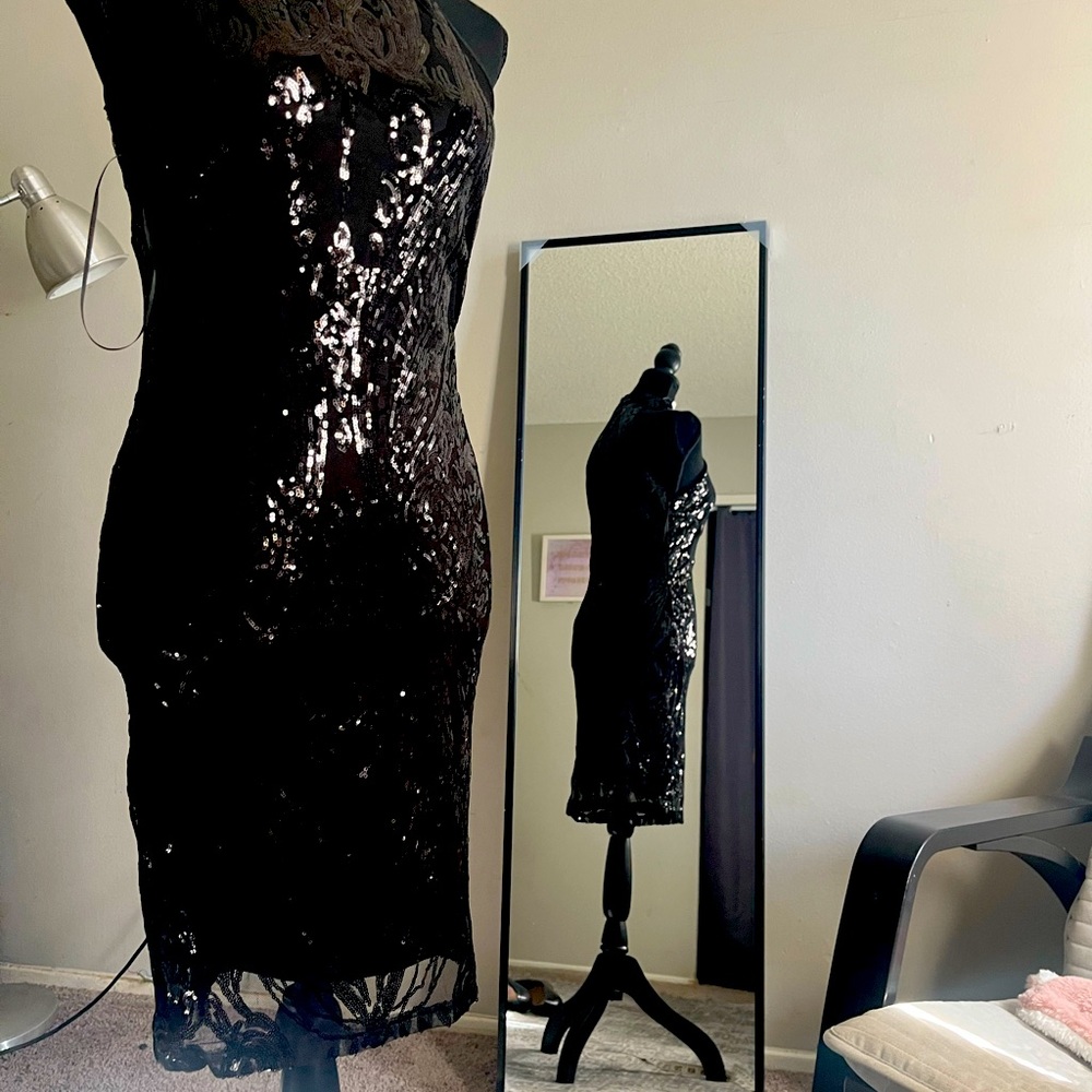 Black New dress  size M  closure in the back sleeveless